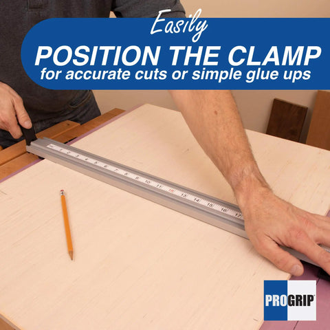 Man using lightweight straight edge clamp for large plywood sheets and dado slots circular saw guide rail for precise cuts.