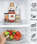 Clear Two Pack Rotating Lazy Susan Organizers With 9 And 10 Inch Countertop Turntables For Kitchen Cabinets Pantry Spice Racks Making Pantry Storage Slick And A Total Breeze On Your Counters, shown with drinks and vegetables in refrigerator.