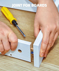 Hand using a screwdriver to secure Top Rated Furniture Cam Lock Screws And Connectors M6 X 40mm Zinc Plated Steel Build.