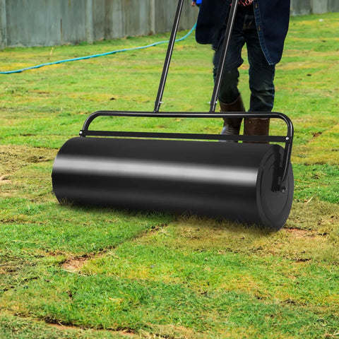 Man using Heavy Duty Steel Lawn Roller 17 Gallon Push Pull Sod Roller Water And Sand Filled 36 By 12 Inch For Lawn Leveling And Seeding