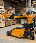 Top Quality Multi Function Hustle Ready Heavy Duty Glass Vacuum Lifter showcasing its electric lifting arm in a workshop.