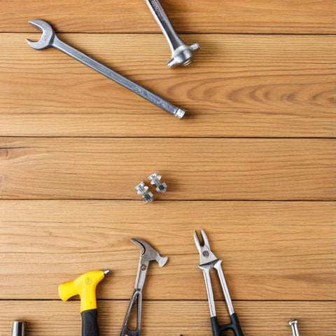 Pair M Two Point Five By Zero Point Four Five By Seven Pro Grade Miniature Screws on wooden surface with tools