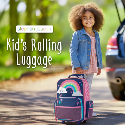 Stephen Joseph kids rolling luggage; front view of pink and navy carry-on with rainbow and clouds