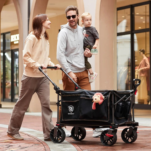 Family using Folding Push Wagon With Brakes, Portable Collapsible Shopping Cart on all terrain big wheels with adjustable handle outdoors