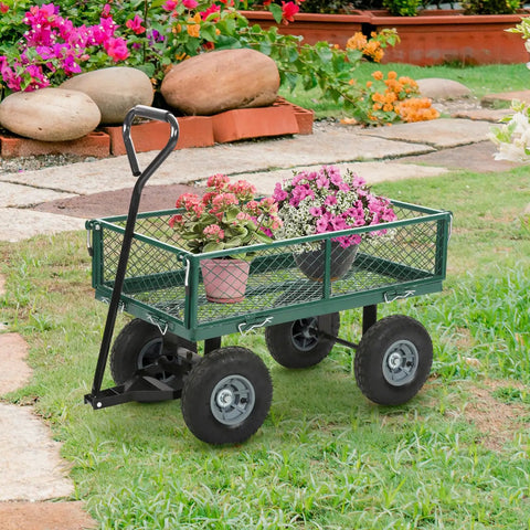 Heavy Duty Garden Cart With 500 Lbs Capacity, Utility Wagon With Removable Sides And 180 Degree Rotating Handle For Yard in garden setting.
