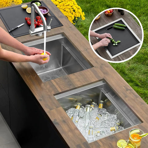 Cleaning a lemon in the Badass Hella Insulated Workstation Sink For Outdoor Kitchen Bar Station With Deep Stainless Bowl.