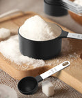 Measuring Cups And Spoons Set Nesting Stackable With Stainless Steel Handles For Cooking And Baking, Rust Resistant Kitchen Gadgets That Make Measuring A Breeze, Includes Five Cups And Five Spoons, Black, with sugar in measuring cup