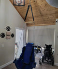Room with a blue swing chair setup showcasing Beefy Industrial Strength Swing Swivel with Frictionless 360 Degree Eye To Eye Rotation.