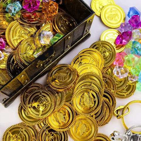 Open pirate treasure chest toy with coins and gems scattered, perfect for kids' adventure and imaginative play.