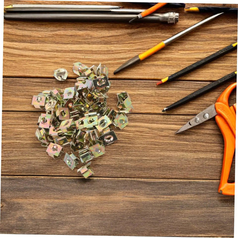 50 Piece Top Shelf Heavy Duty U Nut Fasteners Golden Captive Clips for Car Bumper and Grille Mounting on wood surface