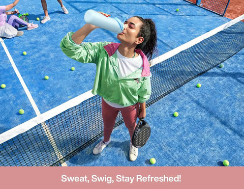 Woman drinking from 26 Oz Stainless Steel Insulated Water Bottle With 2 In 1 Straw And Spout Lid Keeps Drinks Ice Cold All Day Leak Proof