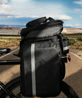 Cool Quick Access Cycling Frame Bag For E-Bike And Mountain Bike With Sleek Wedge Shape To Carry Small Essentials On Your Ride Smoothly Today. Black nylon 1.2L bike frame bag with side zipper on an e-bike.