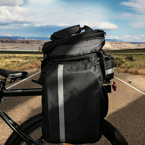 Cool Quick Access Cycling Frame Bag For E-Bike And Mountain Bike With Sleek Wedge Shape To Carry Small Essentials On Your Ride Smoothly Today. Black nylon 1.2L bike frame bag with side zipper on an e-bike.