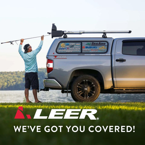 Man adjusting fishing rod on truck with camper shell, compatible with Replacement Molded Glass Door Strap Hinge Kit for 100XL 100LE 100XR.