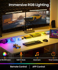 Ergonomic Electric Standing Desk 55 By 28 Inch Adjustable Sit Stand Workstation with RGB lighting, dual monitors, and gaming setup.