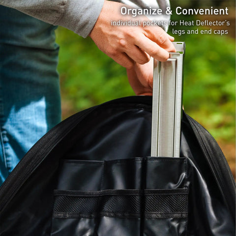 Person placing metal part into Medium Heat Deflector Carry Bag For Bonfire Accessories Weather Resistant Protective Gear Case With Durable Zipper And Handles 600D Solution Dyed Material With PVC Backing Fits 25.8 Inch Deflector