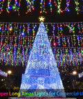 Ultra Bright 1280 LED Christmas String Lights 131 Ft With 240 Drops, multicolor display with a large illuminated tree.