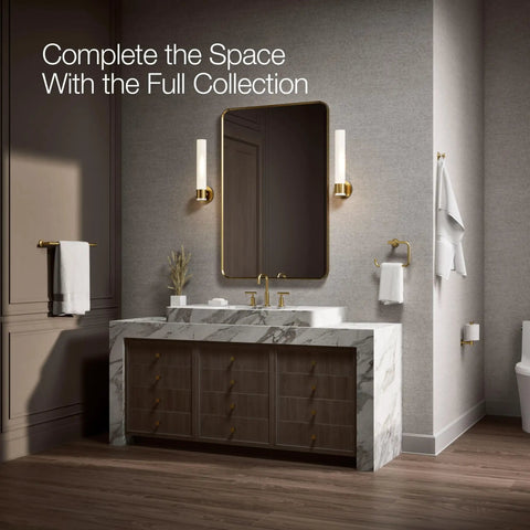 Purist 18-Inch Towel Bar In Vibrant Brushed Moderne Brass Dope Finish in elegant bathroom setting with marble sink