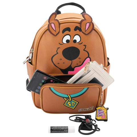 Snag This Totally Rad Scooby Doo Big Face Mini Backpack Purse Crafted From Premium Faux Leather With Detachable Mystery Machine Card Holder And Glitter 3D Ear Detail For Teens And Young Women, showing phone, wallets and colorful details.