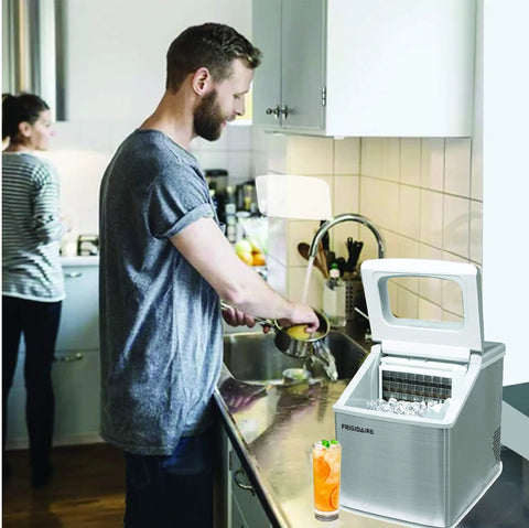 Big Capacity Clear Ice Maker For Home Bar 40 Lbs Output Stainless Steel on countertop beside couple in kitchen