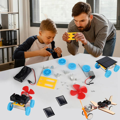 Boy and man assembling 4 In 1 Solar Power And Electric Motor STEM Kit For Kids Beginners With Solar Car on table