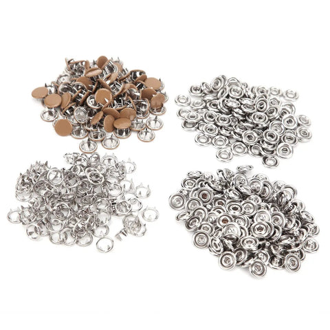 All-in-One DIY-Friendly 100-Piece Brass Snap Fasteners Kit Gold Tone for Crafting, Sewing and Leather Work, Rustproof and Durable with Hollow and Solid Snaps, Equal Male and Female Pieces, Easy Install brass snaps set shown in four piles