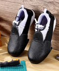 Heavy Duty Steel Toe Covers For Shoes Non Slip Safety Overshoes With Durable Anti Crush Guard Universal Fit Work Boot Protectors Built Tough For Industrial Job Sites And Day Shift Grip, black synthetic leather, close-up view.