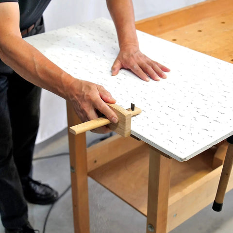 Person using Woodworking Marking Gauge 4.75 Inch 120mm Adjustable Kebiki Japanese Scribe for precision lines on wood board