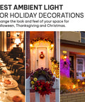Orange LED Lit Flame Bulbs With Four Modes Indoor Outdoor Use 3W E26 E27 2 Pack lighting up festive holiday decorations.