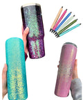 Glitter-coated tumblers showcasing Grande Finale Tumbler Coat Gloss Finish For 12oz Tumblers, Quick 2 Hour Dry Time, Non Toxic And Non Yellowing Indoor Safe Sealant, Easy Prep For Plastic Ceramic Glass, Durable Slick Shine Without Hazing, held against a white background with decorative pens.