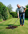 Beastly 60 Inch Adjustable Lawn Leveling Rake With Heavy Duty Flat Head And 1 Inch Diameter Stainless Steel Handle For Quick Soil Leveling And Smooth Grass In Yard Golf Course And Field used by man on lawn