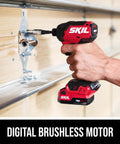 Grit And Grind 12V Brushless Drill Driver And Impact Driver Combo Kit in use on a garage wall with digital brushless motor.