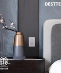 Ultra Slim Digital Dimmer Switch With Air Gap Cut Off, on wall in modern bedroom with vase and flowers, ETL listed, white finish