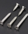 Heavy Duty Fifty Pack 12 X Half Inch Flat Head Phillips Self Tapping Screws Stainless Steel 304 on a black background.