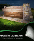15W LED Outdoor Flood Light For Security, 1500 Lumens, 5000K Daylight White illuminating stone sign at night