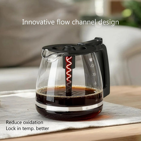 Replacement Glass Coffee Carafe For 12 Cup Coffee Makers With Black Handle on a table with innovative flow design.