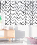 Black And White Peel And Stick Wallpaper Stripe Herringbone Geometric Textured Self Adhesive Contact Paper on white wall in living room.