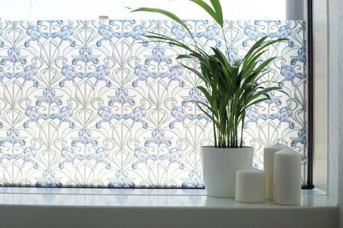 Self-Adhesive Privacy Glass Window Film In Minster/Iris Pattern, 17 X 78 Inch Roll on window with plant and candles