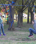 Children playing on backyard zip line with Heavy Duty Trolley For Cable With Quick Setup, Smooth Glide Zip Line Slack Line Gear.