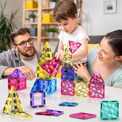 Family playing with Magnetic Tiles Building Blocks Set For Kids 110 Pieces STEM Construction Toy With Dinosaur Figures