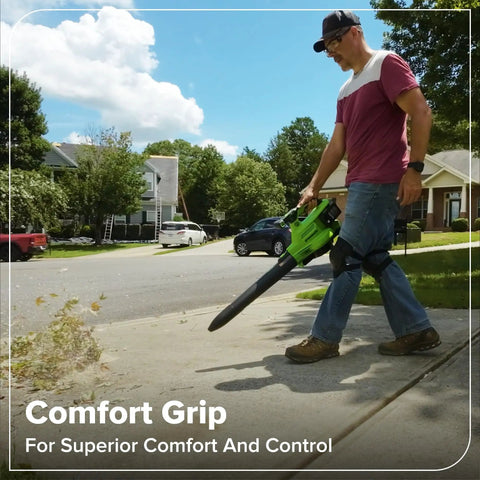 Person using Three In One Cordless Leaf Blower Vacuum Mulcher With Dual 48V Batteries for quick sidewalk cleanup.
