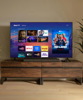 55 Inch QLED Smart TV With Sharp 4K Resolution And Rich HDR10 Colors Plus Slick Built In Apps For Smooth Streaming displayed in a modern living room.