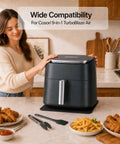 Woman using Slide Mat For 9 In 1 TurboBlaze Air Fryer With Anti Slip Base And Hanging Strap, Easy Clean Countertop Protector.