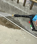 Adjustable High Power Pressure Washer Gun With Swivel Length Options 37, 24, and 10 Inches 2 Extension Wands 5 Nozzles 10 O Rings Thread Adapter Quick Connect 5000 PSI For Heavy Duty Cleaning in action outside against concrete surface