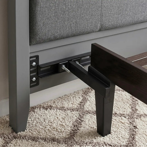 Heavy Duty Adjustable Headboard Brackets For Bed Frame With Complete Hardware Set Black Metal Extension Connector Kit installed on bed.