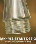 Glass Hummingbird Feeder With Four Flower Ports And Comfortable Perches, Ant Moat And Bee Guards, 8 Oz Nectar Capacity, bottle close-up