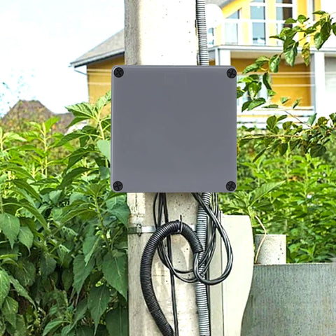4 Pack Heavy Duty Abs Plastic Junction Boxes 6 In X 6 In X 3 In IP65 Waterproof Outdoor Electrical Conduit Enclosure mounted on a pole.