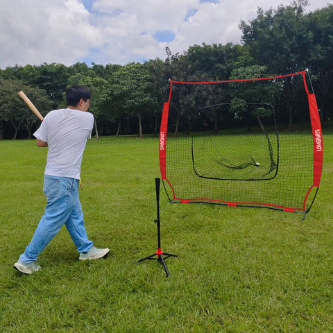Man using Portable 7x7 Baseball Practice Net For Batting Hitting And Pitching, Heavy Duty Steel Frame, in outdoor field