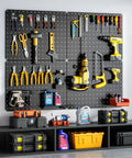 Heavy Duty Metal Peg Board Kit With 110 Pieces, 4 Black 12X16 Panels, Accessories And Hook Locks mounted on garage wall