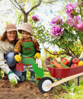 Kid Friendly Gardening Wheelbarrow Set With Real Wheelbarrow, Wooden Tools, Apron, Gloves in garden setting with child and adult
